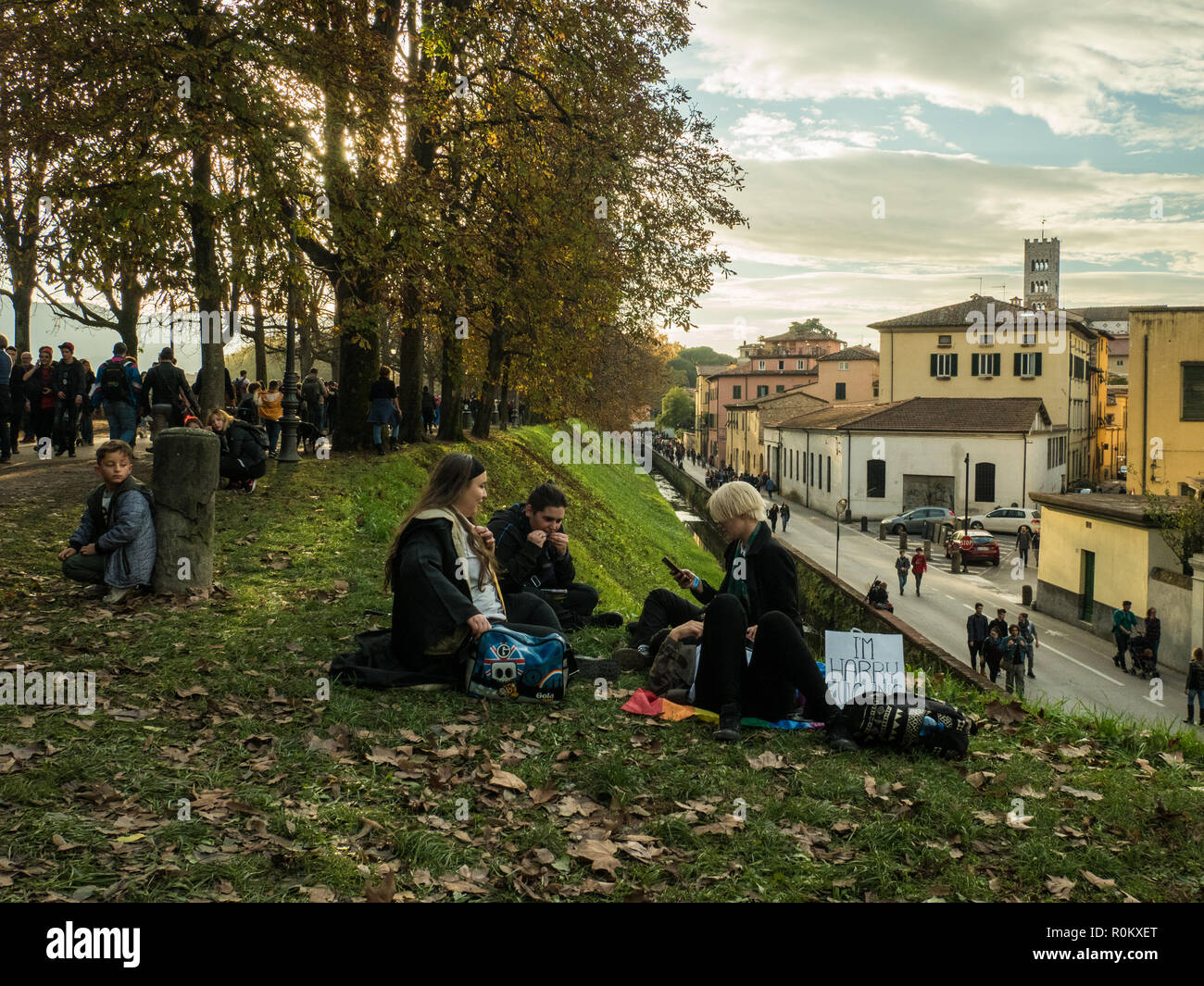 Participants taking time out at the Lucca comics & games, an annual comic book and gaming convention in the walled city of Lucca, Tuscany, Italy Stock Photo