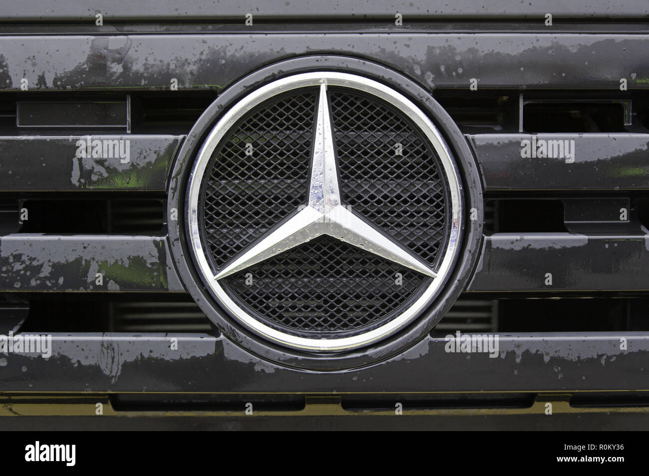 Mercedes benz truck, mercedes badge detail dipped in a truck racing Stock Photo