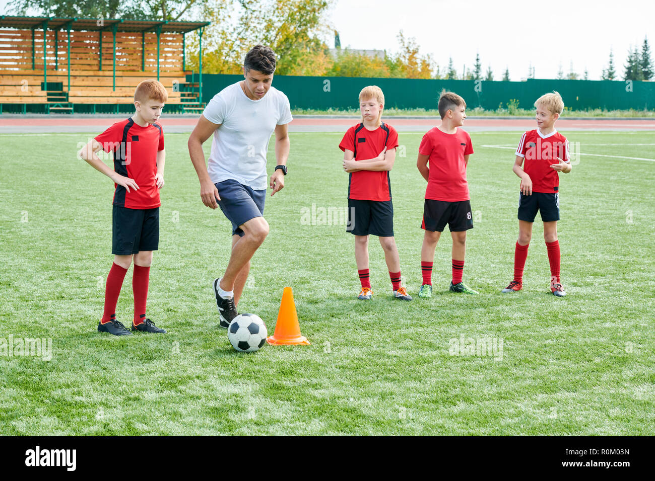 Boy Football Team Training Stock Photo Alamy