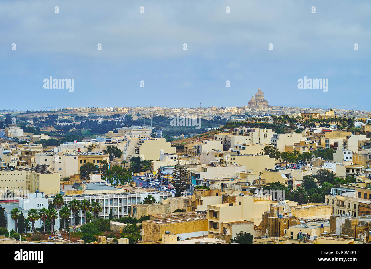The view from Rabat fortress of Victoria on the skyline of Xewkija with its huge Basilica of St John the Baptist, Gozo, Malta. Stock Photo