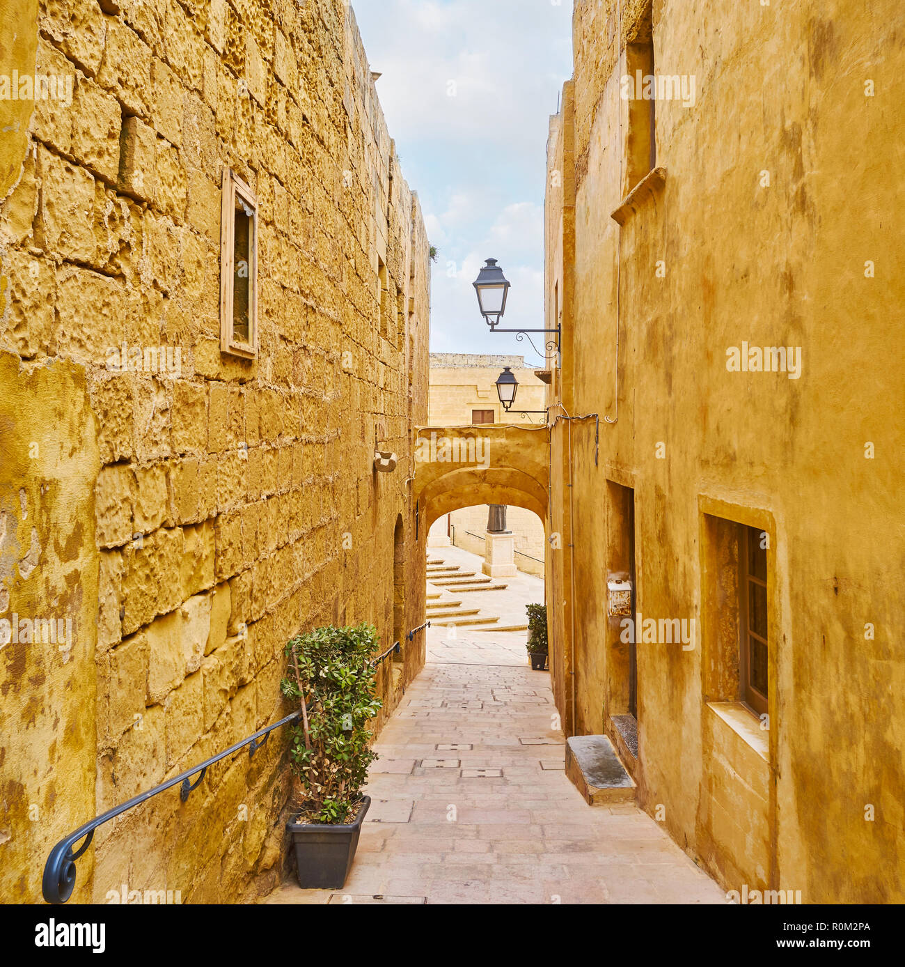 Victoria Rabat Streets The narrow streets of Rabat Citadel, lined with tall stone walls of ...