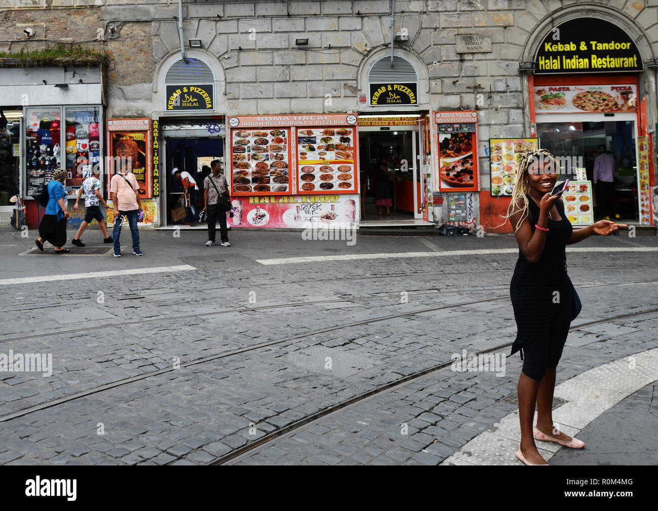An African woman near Termini station in Rome. Stock Photo