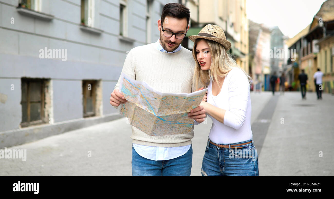 Beautiful tourist couple in love traveling and sightseeing Stock Photo