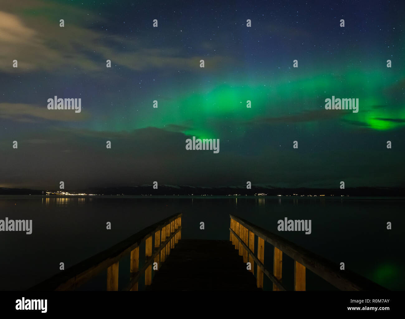 Green northern lights above Trondheimsfjorden in Ranheim, Trondheim area, Norway. Stock Photo