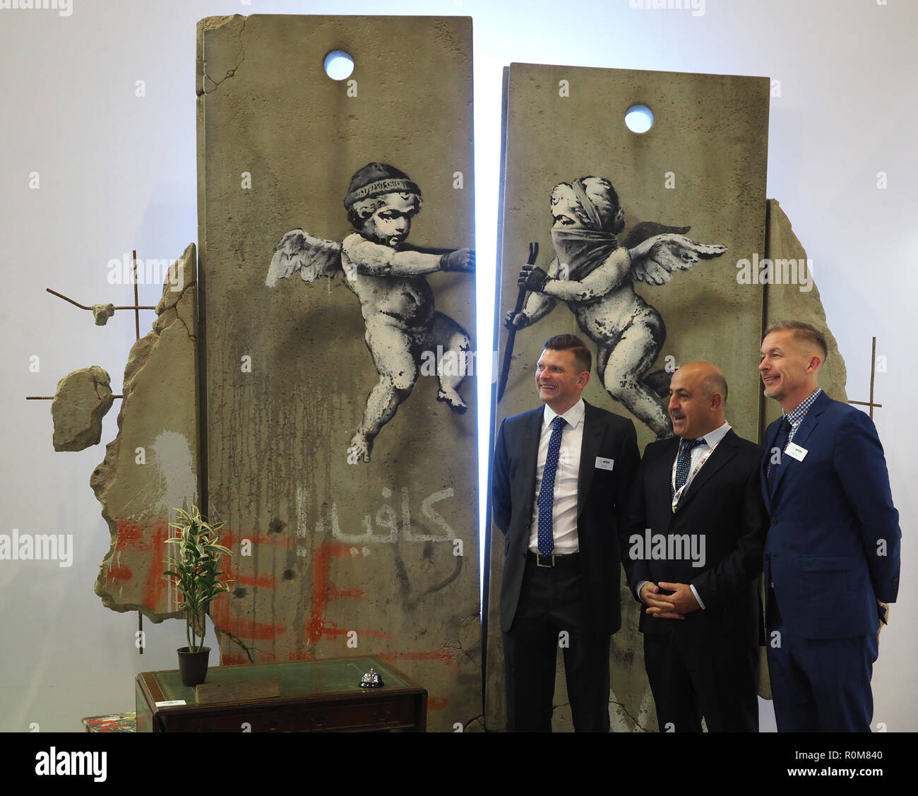 Excel, London, UK. 5th Nov 2018. Replica of Banksy artwork on the Palestine stand at World Travel Market, Excel, London, today (Mon) Credit: Finnbarr Webster/Alamy Live News Stock Photo