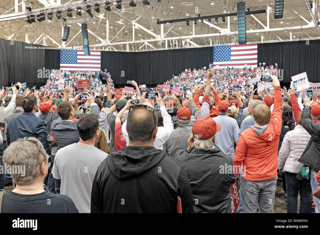 Cleveland, Ohio, USA, 5th Nov, 2018.  Trump supporters rally together during his appearance at the Cleveland International Exposition Center during his final day of energizing Republicans for the November 6, 2018 Midterm Elections.  Cleveland was the first of three final stops of a country-wide effort to get Republican voters to the polls.  Credit: Mark Kanning/Alamy Live News. Stock Photo