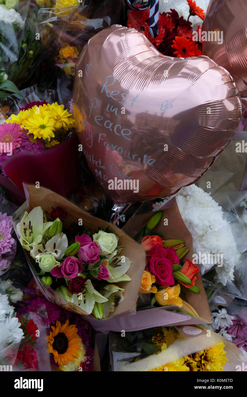 London, UK. 6th Nov 2018. Flowers, balloons, poems and candles outside Clapham South tube station in Lambeth, at the site of a vigil held to remember 17-year-old Malcolm Mide-Madariola, who was the victim of a fatal stabbing on 2 November, part of a recent rise in knife crime in London. Credit: Anna Watson/Alamy Live News Stock Photo