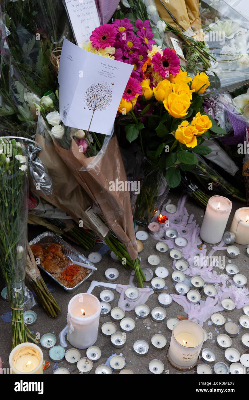 London, UK. 6th Nov 2018. Flowers, balloons, poems and candles outside Clapham South tube station in Lambeth, at the site of a vigil held to remember 17-year-old Malcolm Mide-Madariola, who was the victim of a fatal stabbing on 2 November, part of a recent rise in knife crime in London. Credit: Anna Watson/Alamy Live News Stock Photo