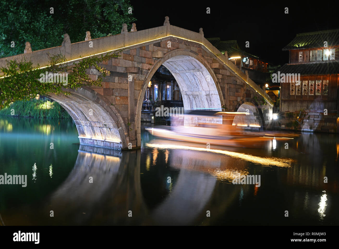 Tongxiang. 6th Nov, 2018. Photo taken on Nov. 6, 2018 shows the night scenery of Wuzhen, east China's Zhejiang Province. The fifth World Internet Conference (WIC) is scheduled to run from November 7-9 in the river town of Wuzhen. Credit: Chen Yehua/Xinhua/Alamy Live News Stock Photo