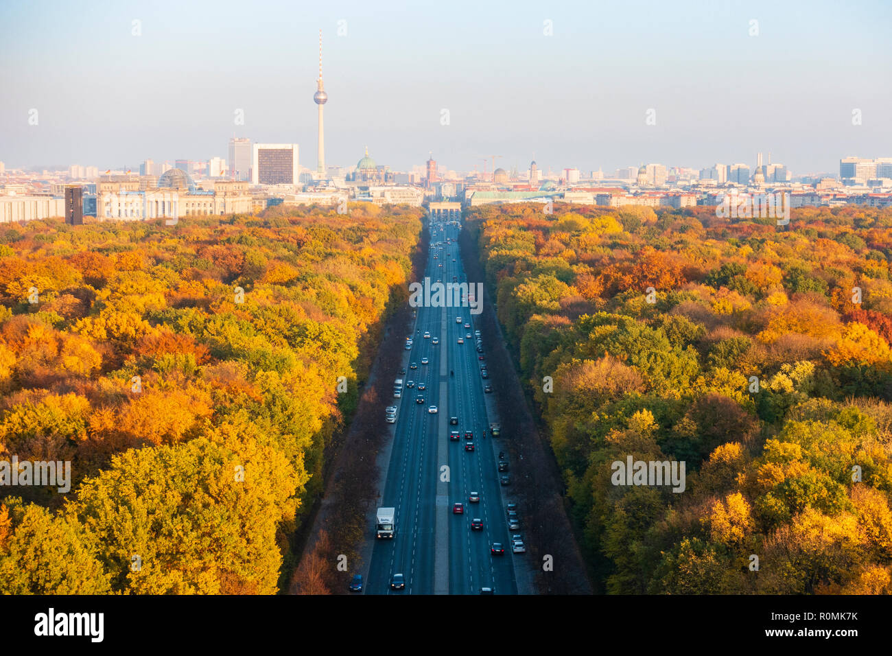 Berlin, Germany. 6 November, 2018. Spectacular late autumn colours of trees in Berlin's famous Tiergarten park in the centre of the city. The Brandenburg Gate and TV Tower are in the far distance. Credit: Iain Masterton/Alamy Live News Stock Photo