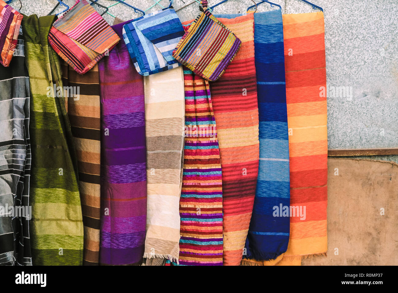 Traditional Moroccan scarves and shawls at a shop in Ouarzazate, Morocco. Stock Photo