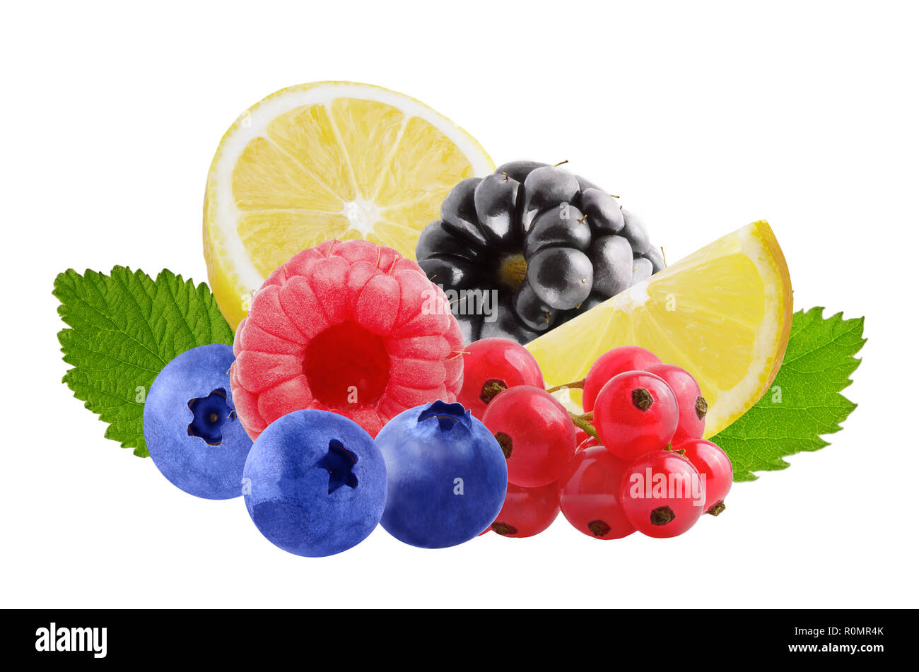 Flying fresh berries and lemon isolated on white background Stock Photo
