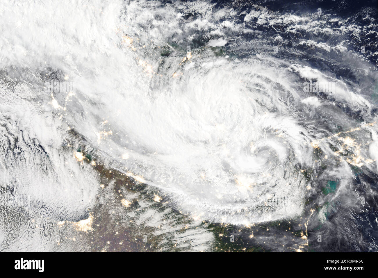 Hurricane over planet Earth - satellite photo. Elements of this image furnished by NASA. Stock Photo