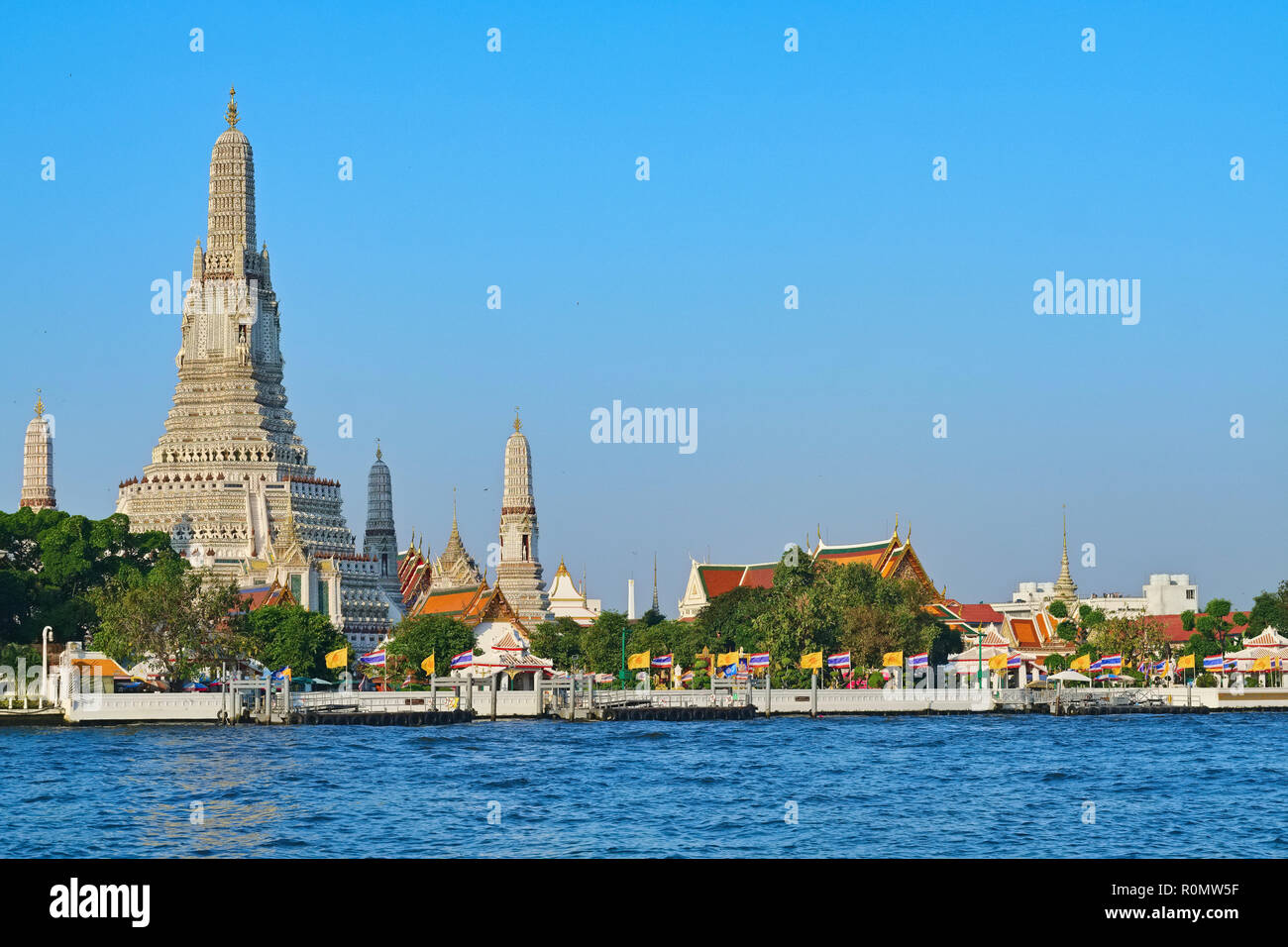 Wat Arun or Temple of Dawn, seen from the opposite bank of the Chao Phraya River, the so-called River of Kings, Bangkok, Thailand Stock Photo