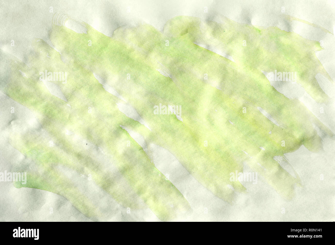 Colorful green and yellow watercolor wet brush paint liquid background