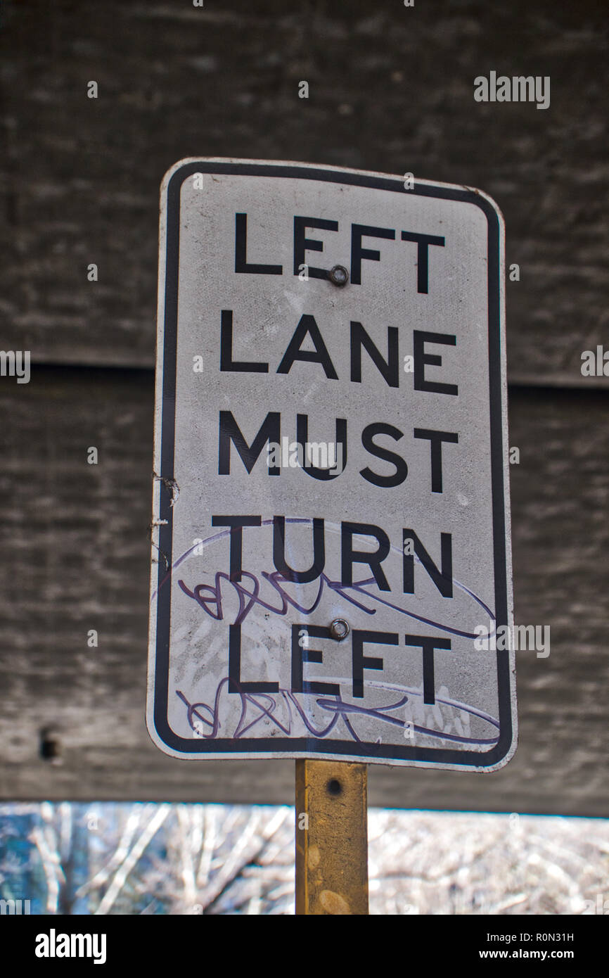 Drive on the left and turn left from this lane Stock Photo