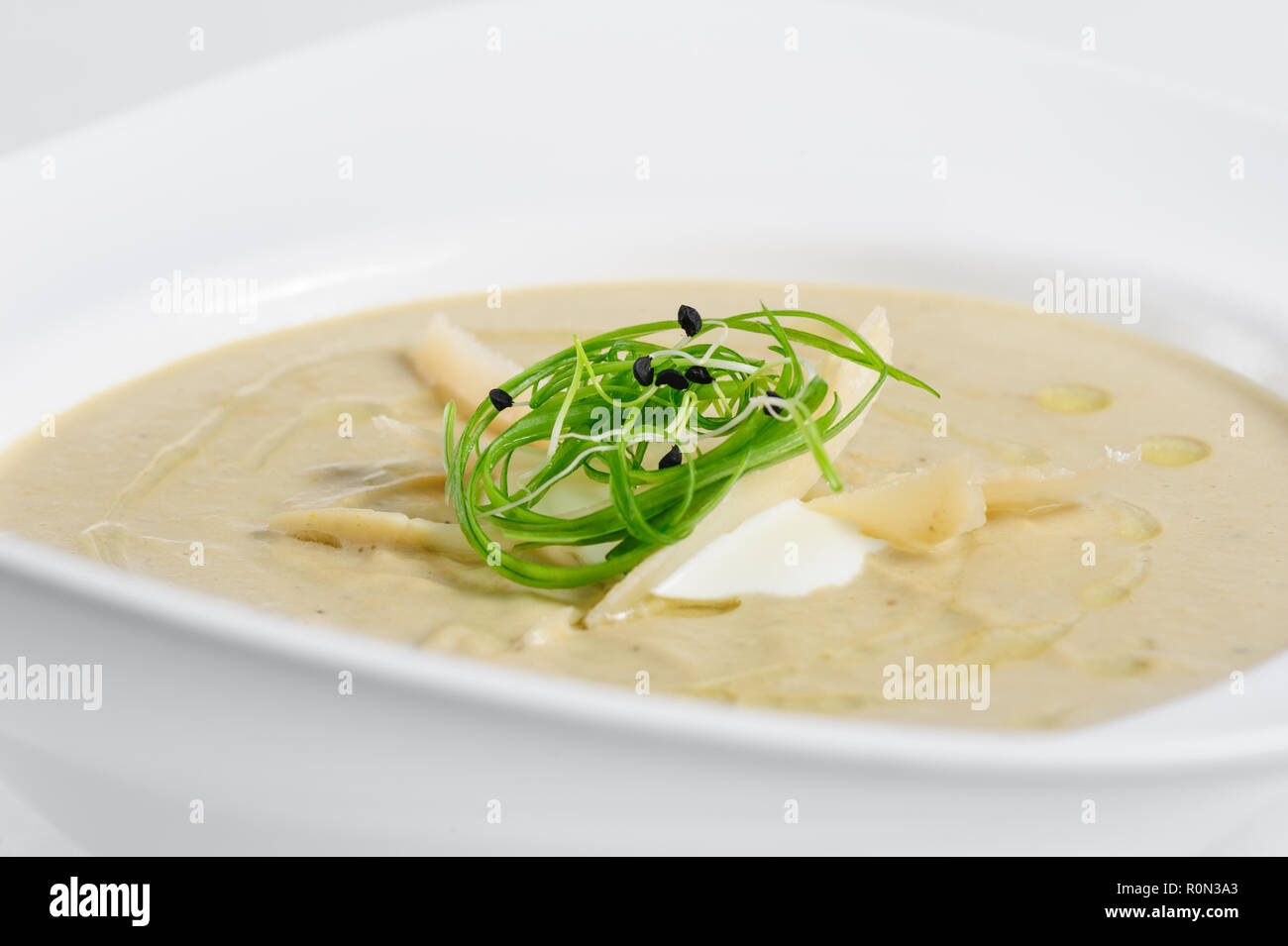 Eggplants cream soup with parmigiano Stock Photo