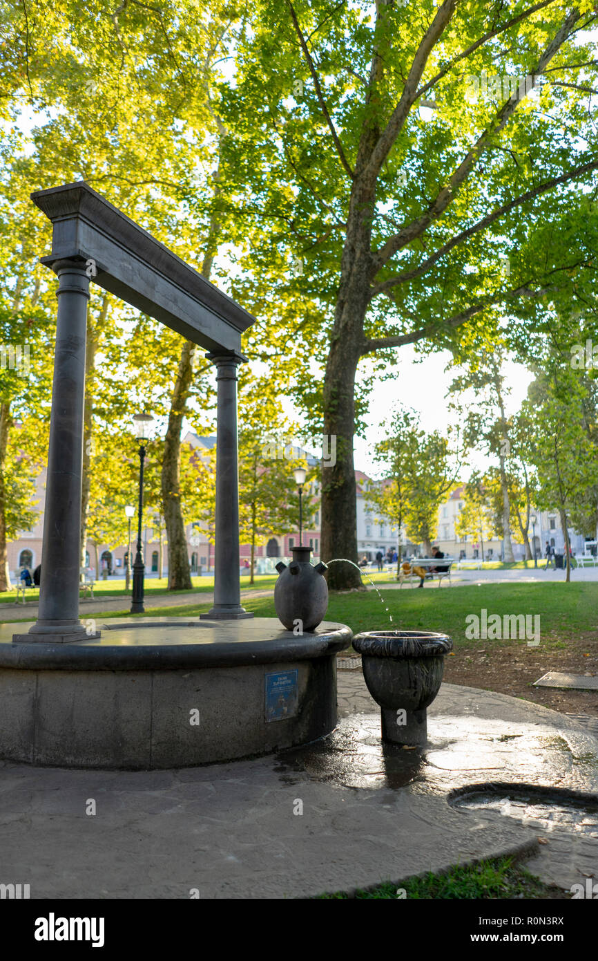 Drinking water fountain in a park in Ljubljana Stock Photo