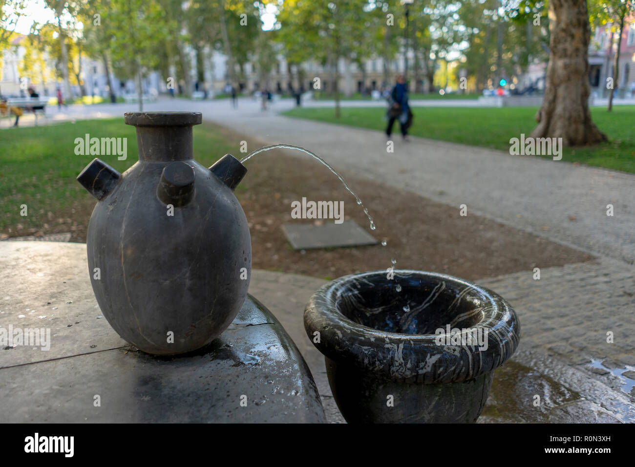 Drinking water fountain in a park in Ljubljana Stock Photo