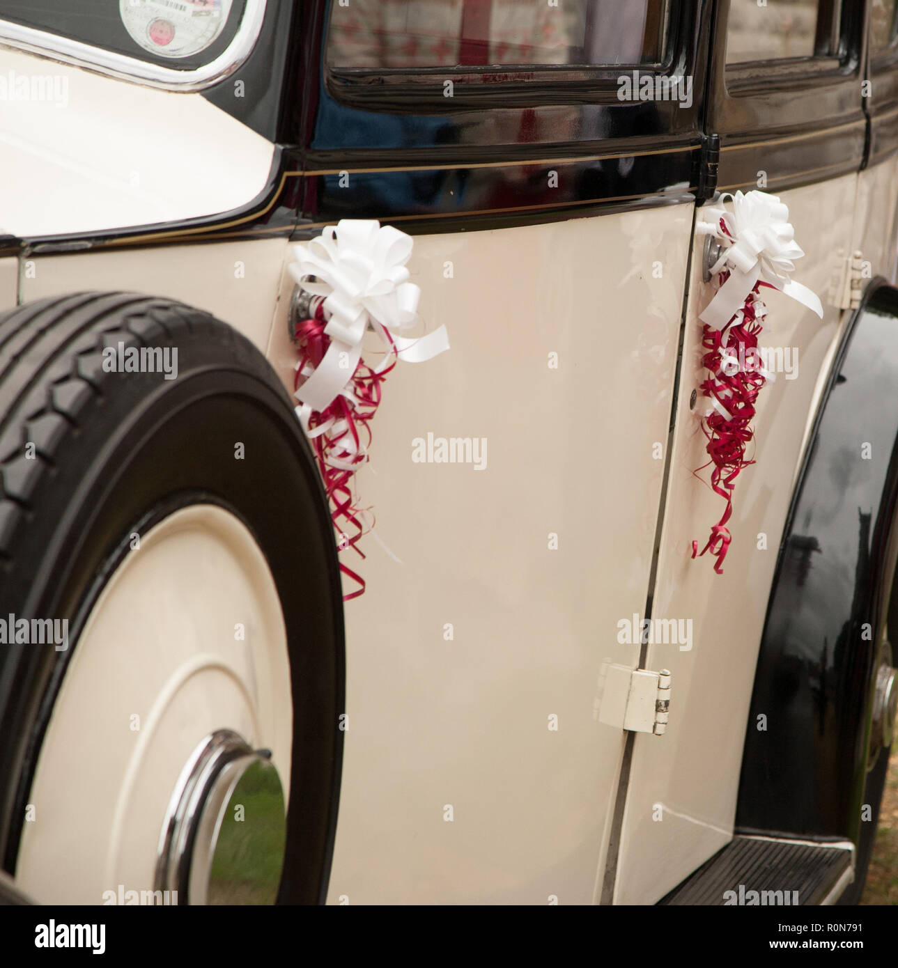 Side glance down a vintage wedding car Stock Photo