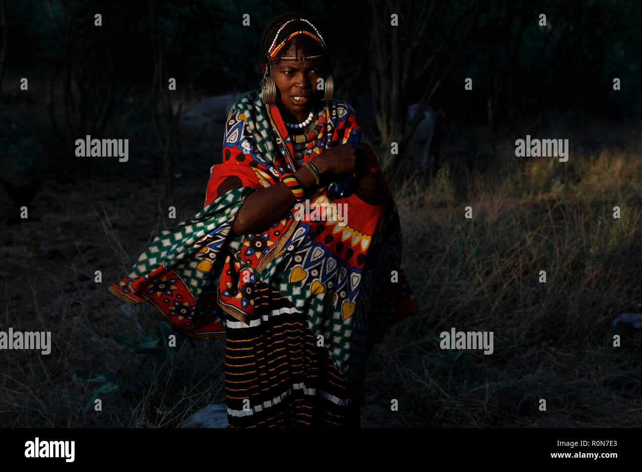 A woman at the beginning of a ceremony  in a Pokot community of herdsmen in Baringo County, Kenya, October 2, 2018. Stock Photo