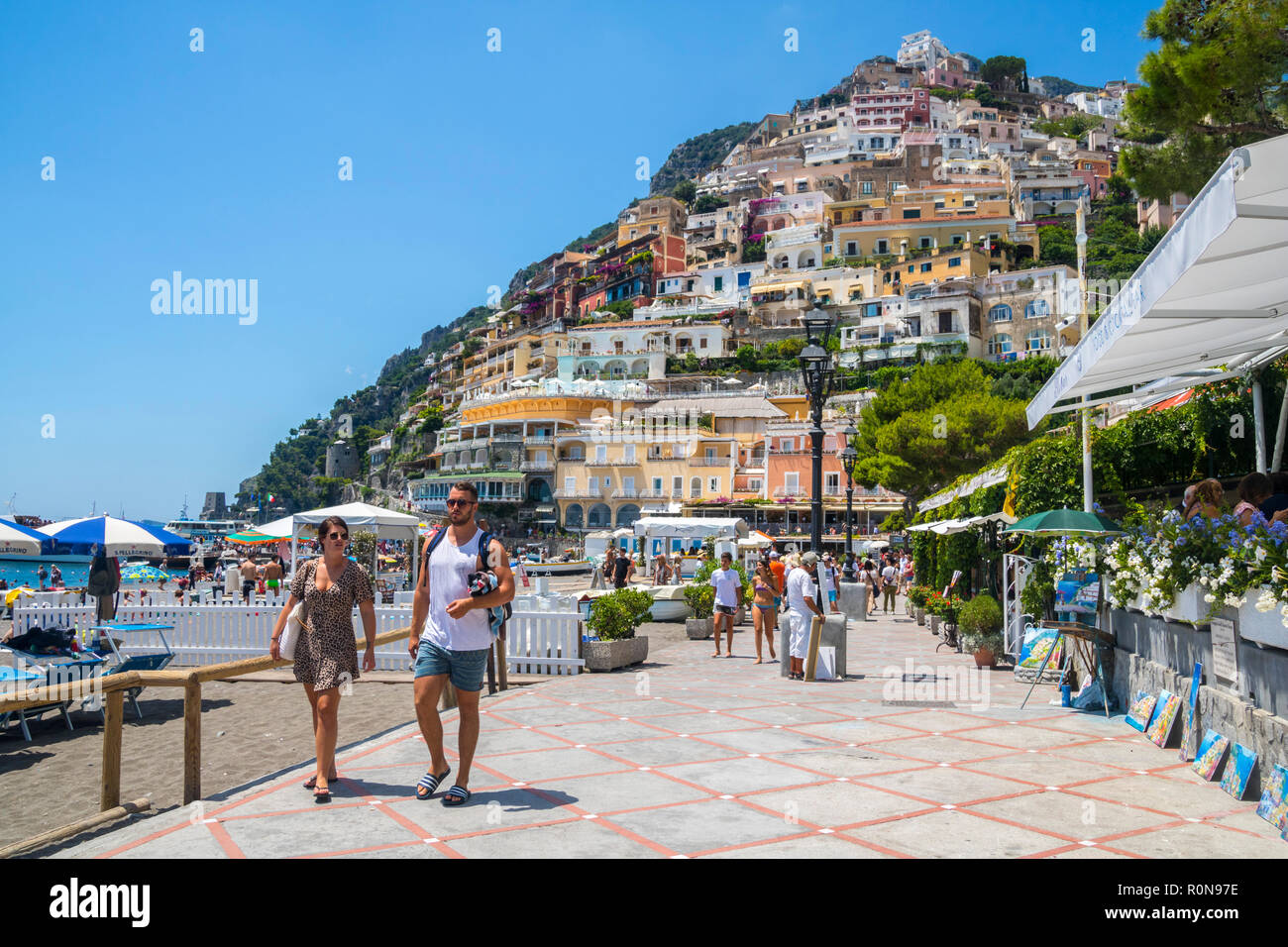 People walking, tourists, Beautiful Stunning, Colourful Promenade, Mountain Village Town, Positano Italy, Iconic, best life concept, travel, vacation, Stock Photo
