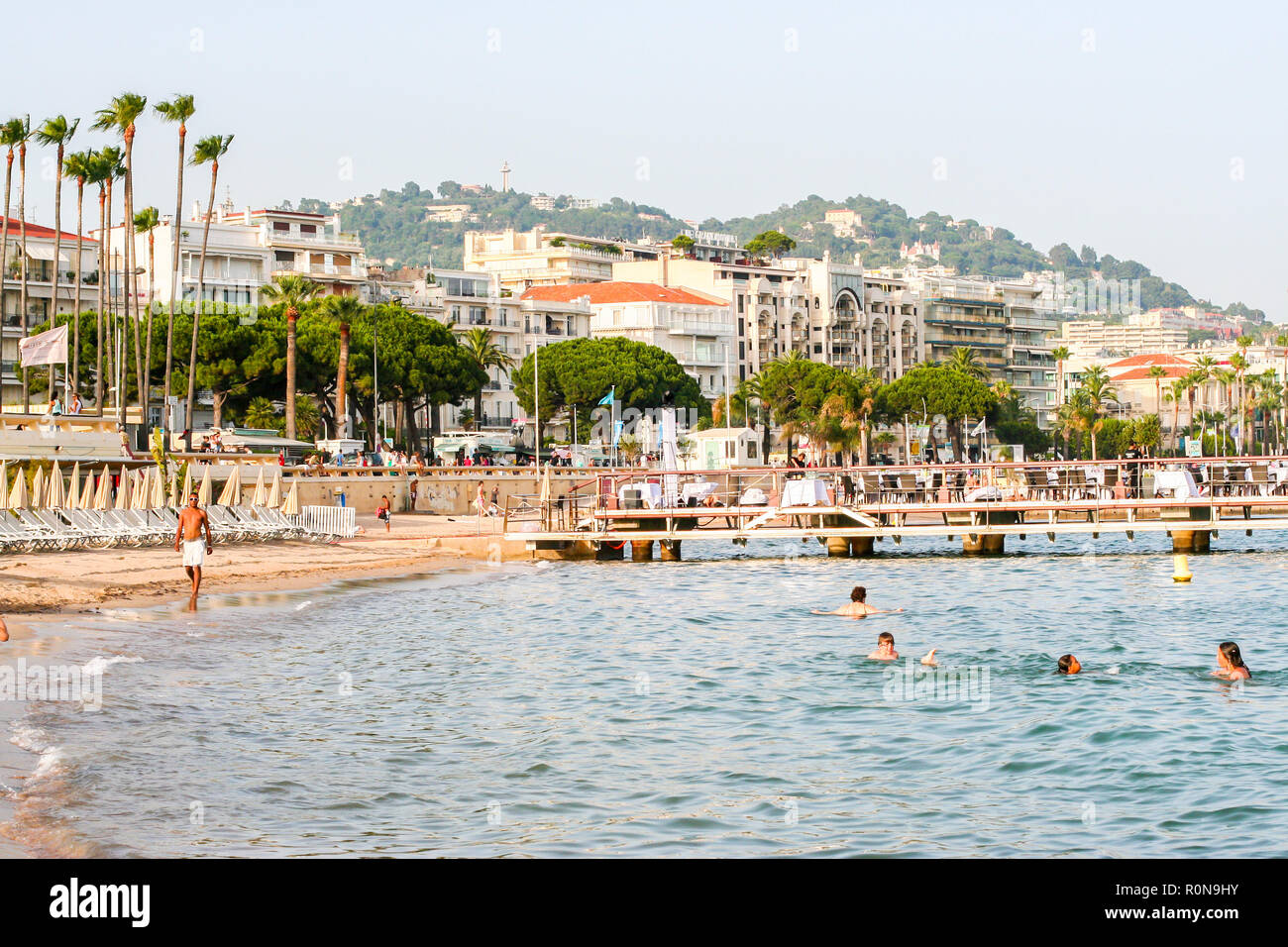 People swimming man walking Public Beach Plage Publique Cannes Côte d ...