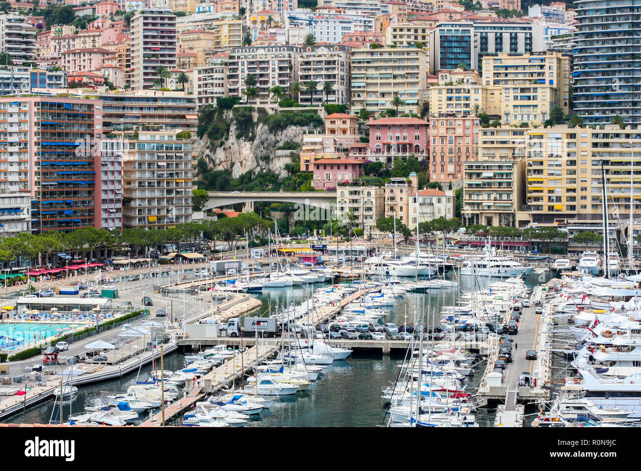 Yachts in Port Hercules Monte Carlo Monaco wealthy concept, built up city living, yacht, boats, super yachts, celebrity lifestyle, rich living, travel Stock Photo