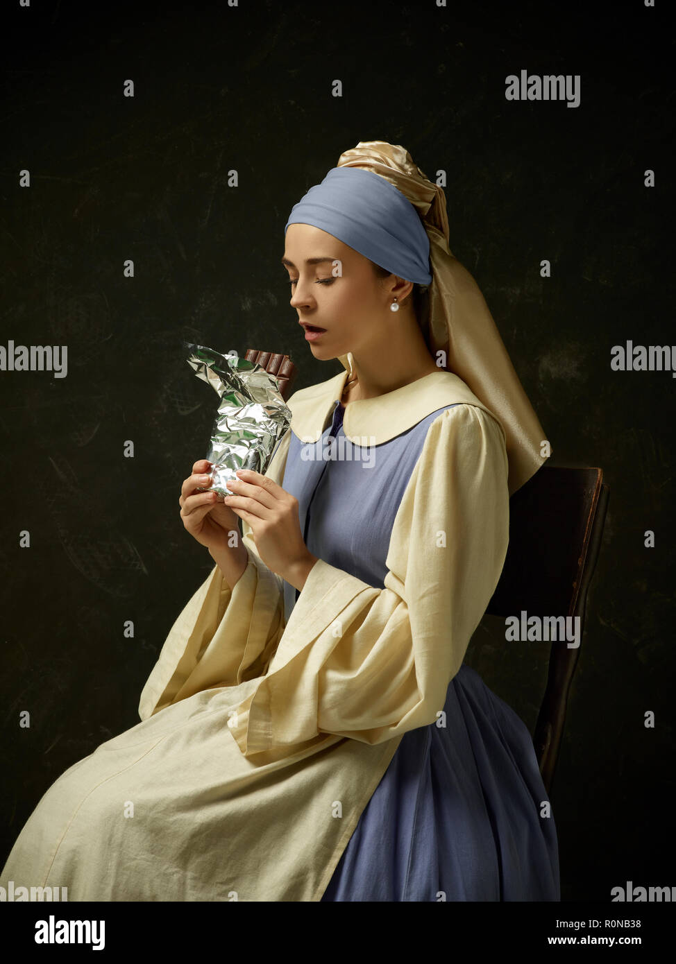 Medieval woman in historical costume wearing corset dress and
