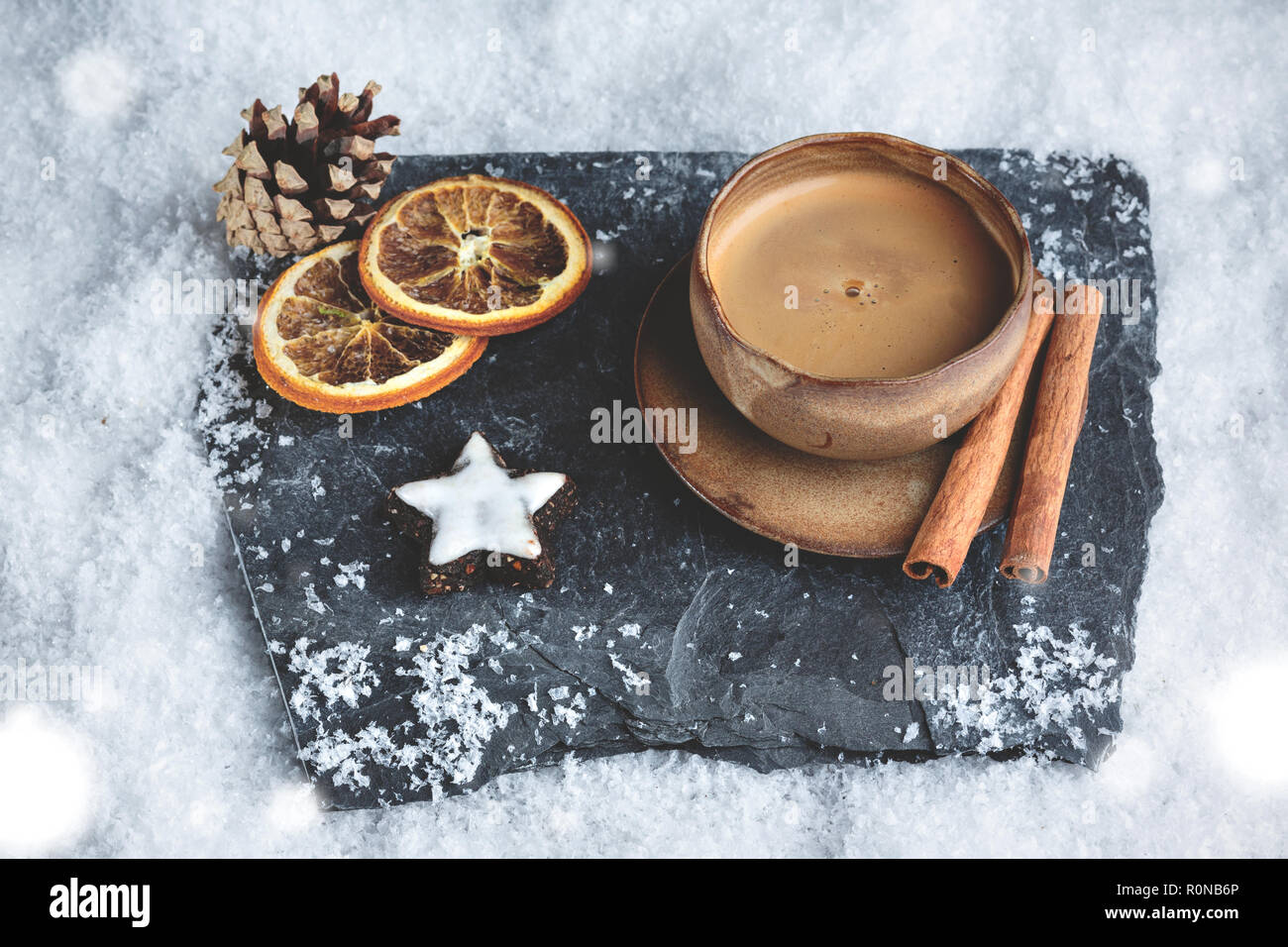 Espresso cup with winter decoration and snow Stock Photo