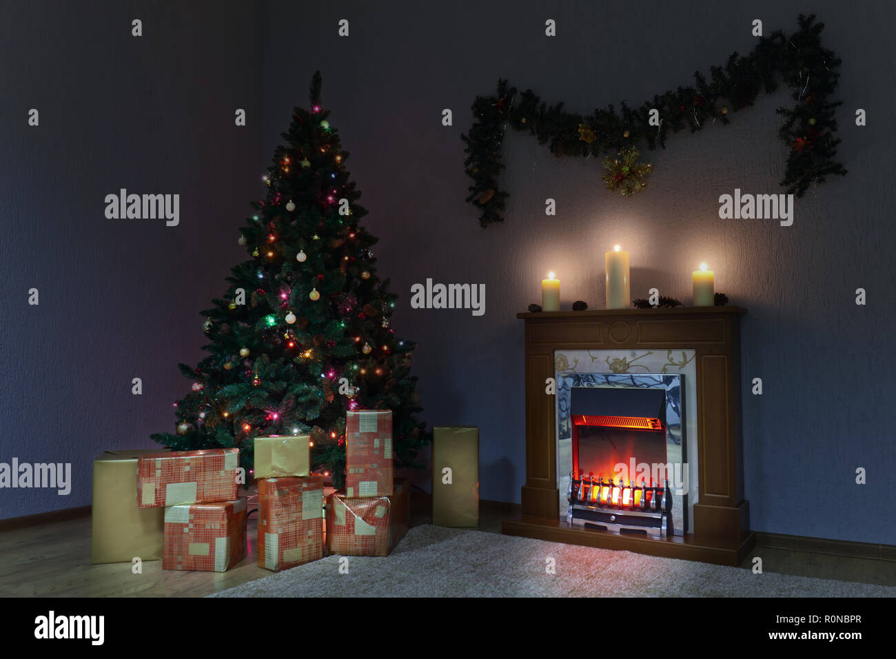 Christmas Tree With Gifts In An Empty Room With Fireplace Stock