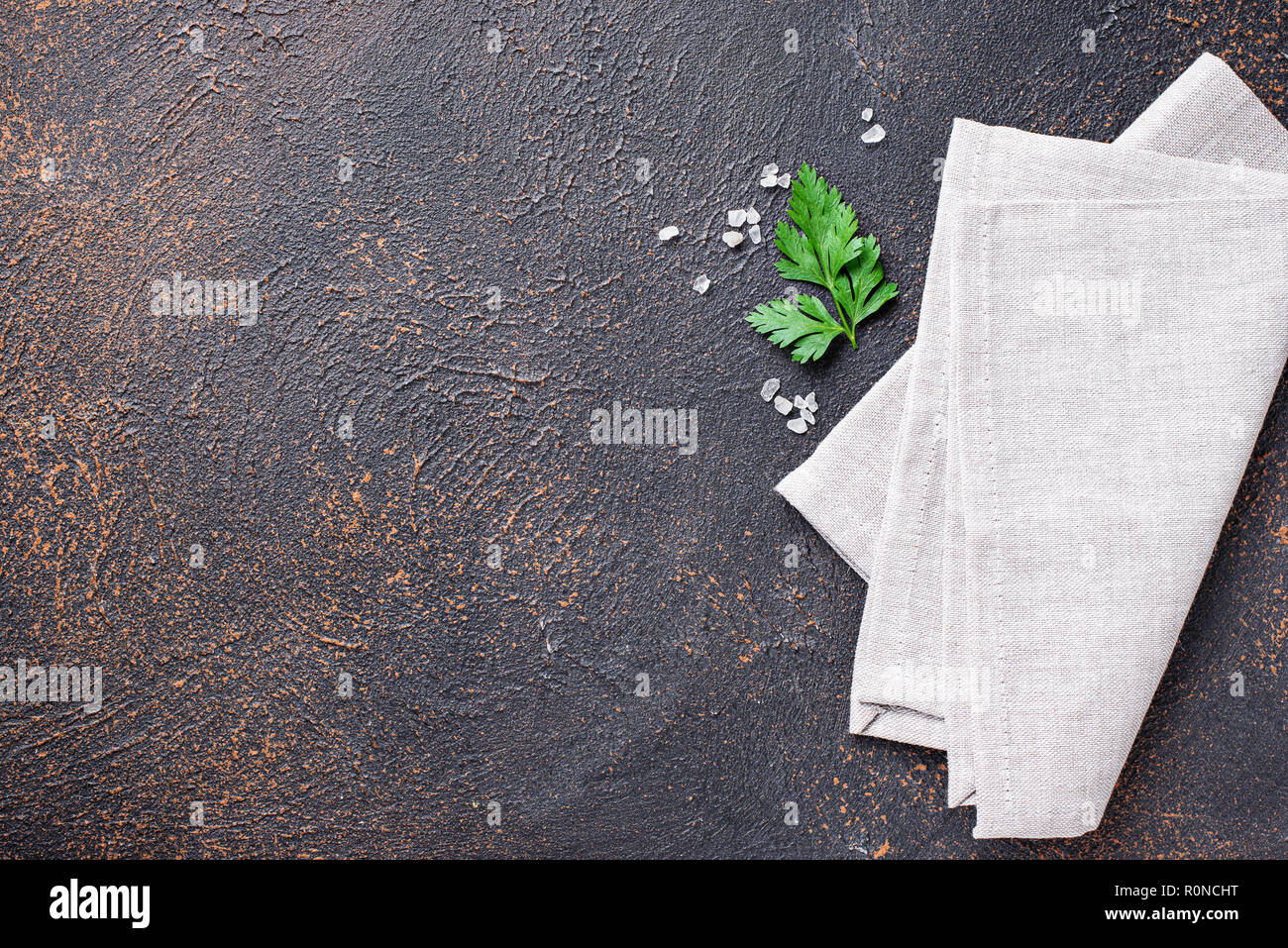 Culinary background with napkin and parsley Stock Photo