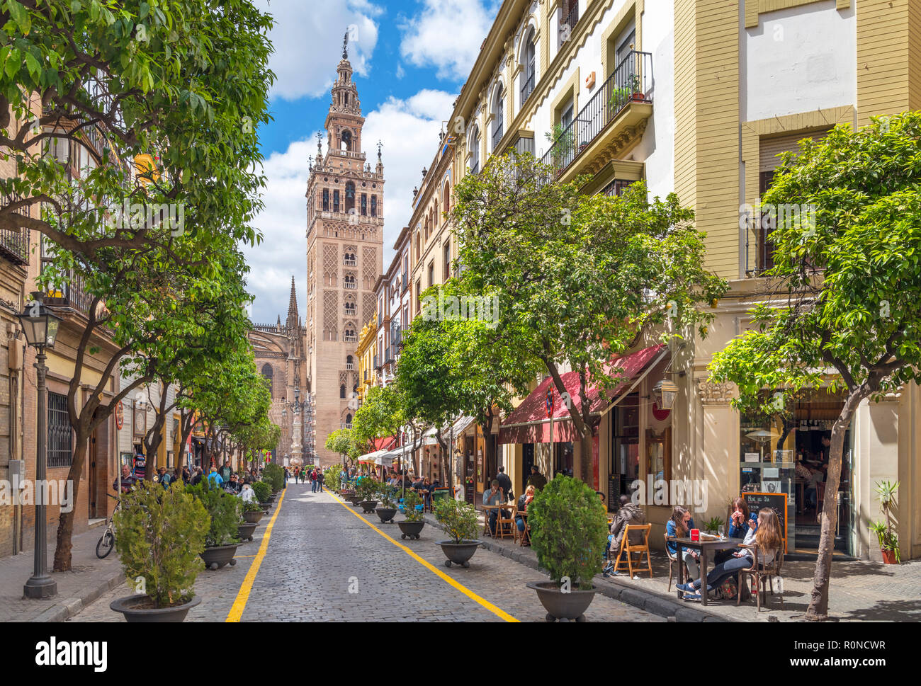 Cafes on Calle Mateos Gago looking towards the Giralda tower and