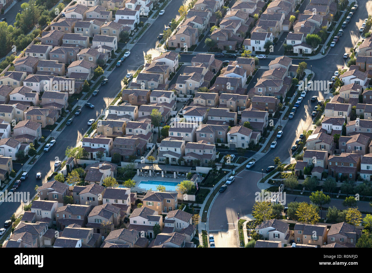 Late afternoon aerial view of tightly packed modern homes in the Porter Ranch area of Los Angeles, California. Stock Photo