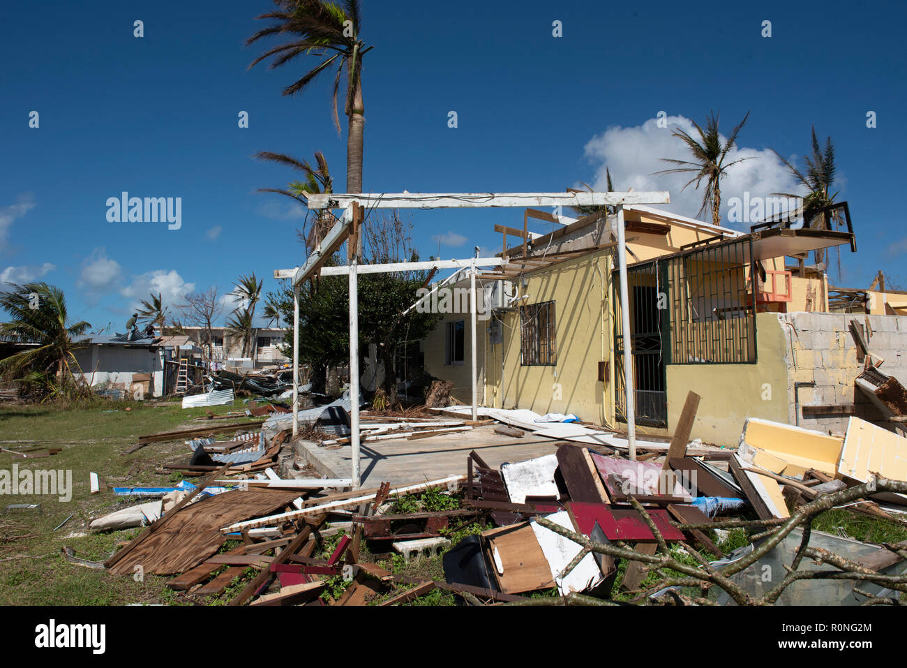 Homes nearly completely destroyed by Super Typhoon Yutu as emergency