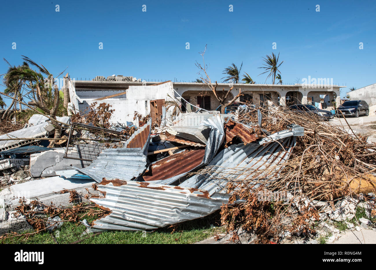 Homes nearly completely destroyed by Super Typhoon Yutu as emergency relief efforts begin November 3, 2018 in Saipan, Commonwealth of the Northern Mariana Islands. The islands were devastated by Typhoon Yutu on October 28th, the strongest typhoon to impact the Mariana Islands on record. Stock Photo