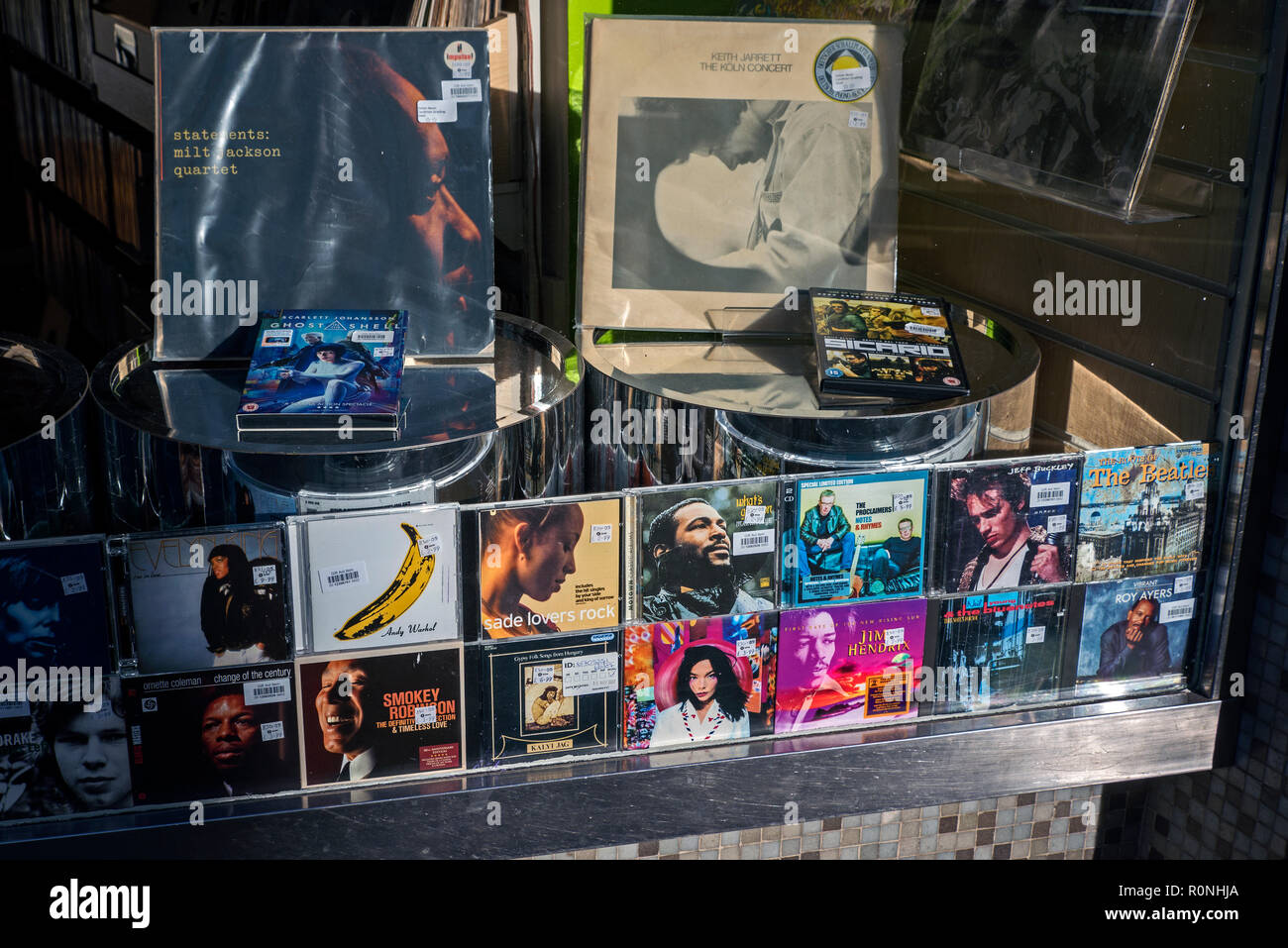 Vinyl records and CD's in the window of a charity shop in Stockbridge, Edinburgh, Scotland, UK