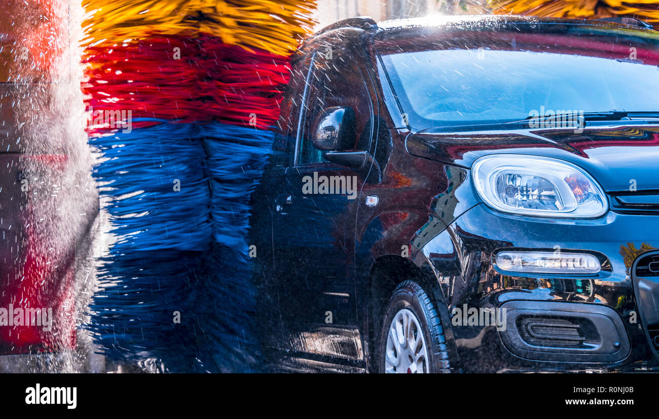 Car going through an automated car wash machine Stock Photo Alamy