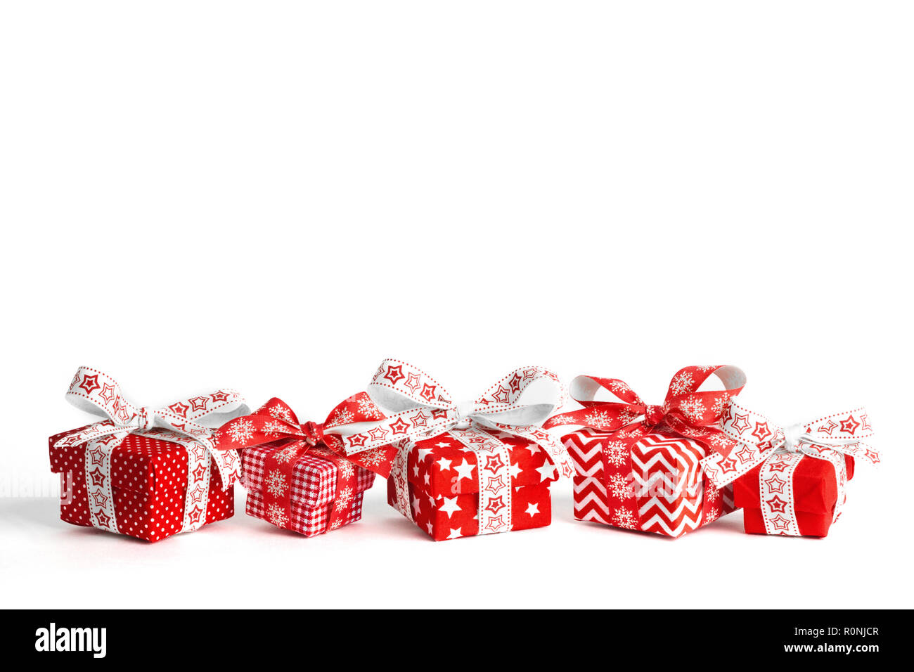 Christmas gift boxes isolated on white background Stock Photo - Alamy