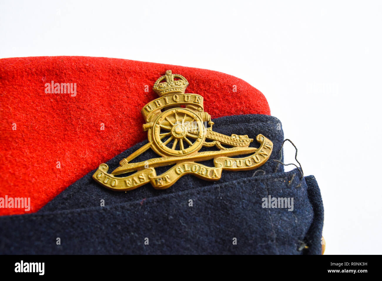 Second World War British Army Royal Artillery forage cap with badge and Latin motto, Ubique Quo Fas et Gloria Ducunt. Dress uniform red and blue Stock Photo