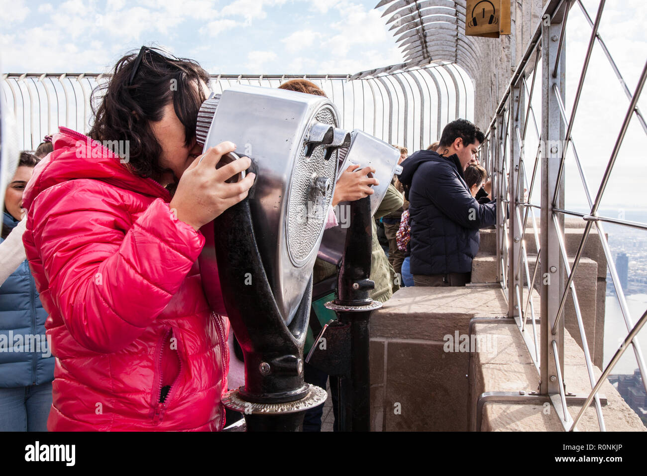 Tourists at the top of the Empire State Building, New York City, United States of America. Stock Photo