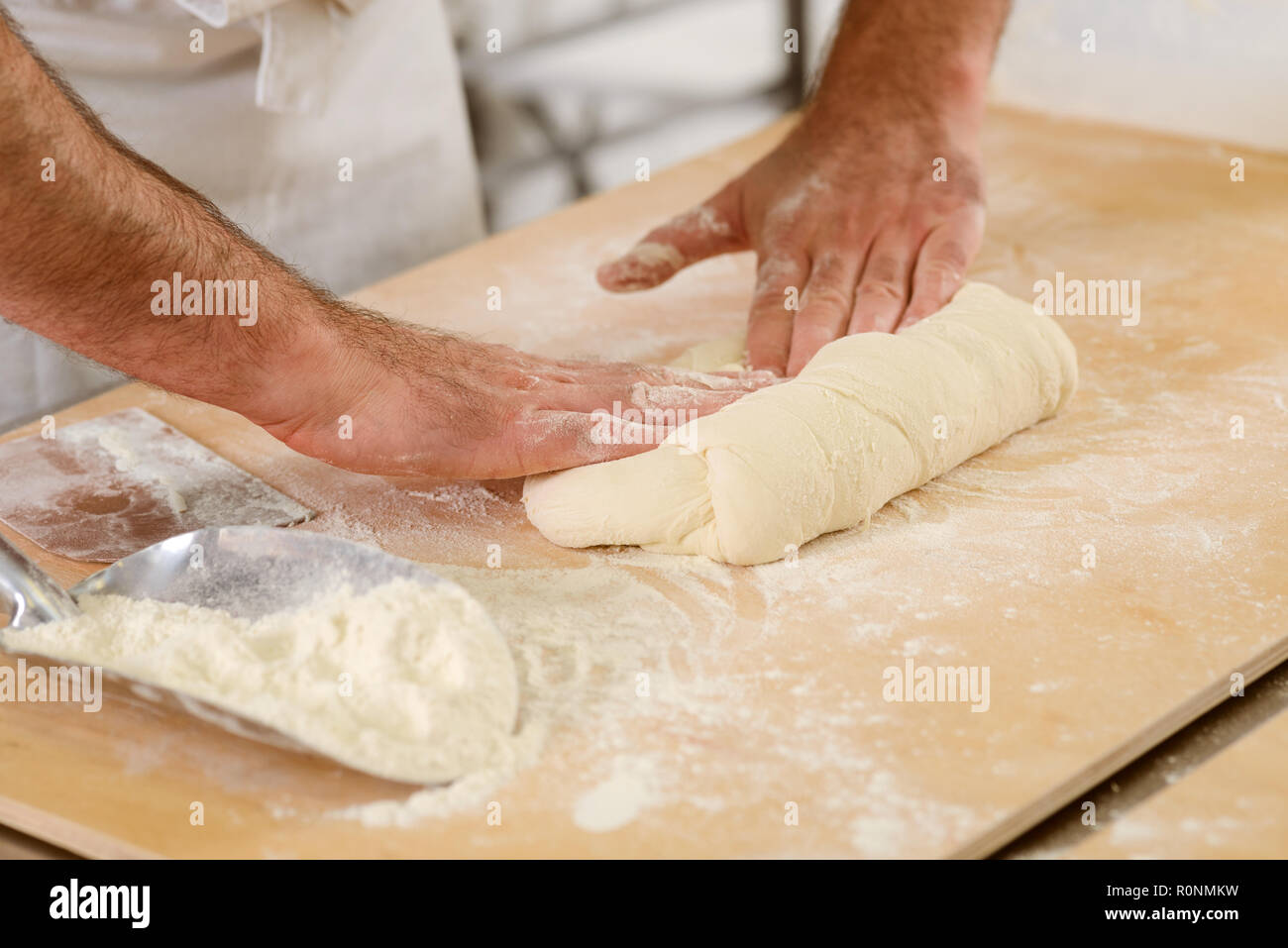 Man is kneading yeast dough Stock Photo Alamy