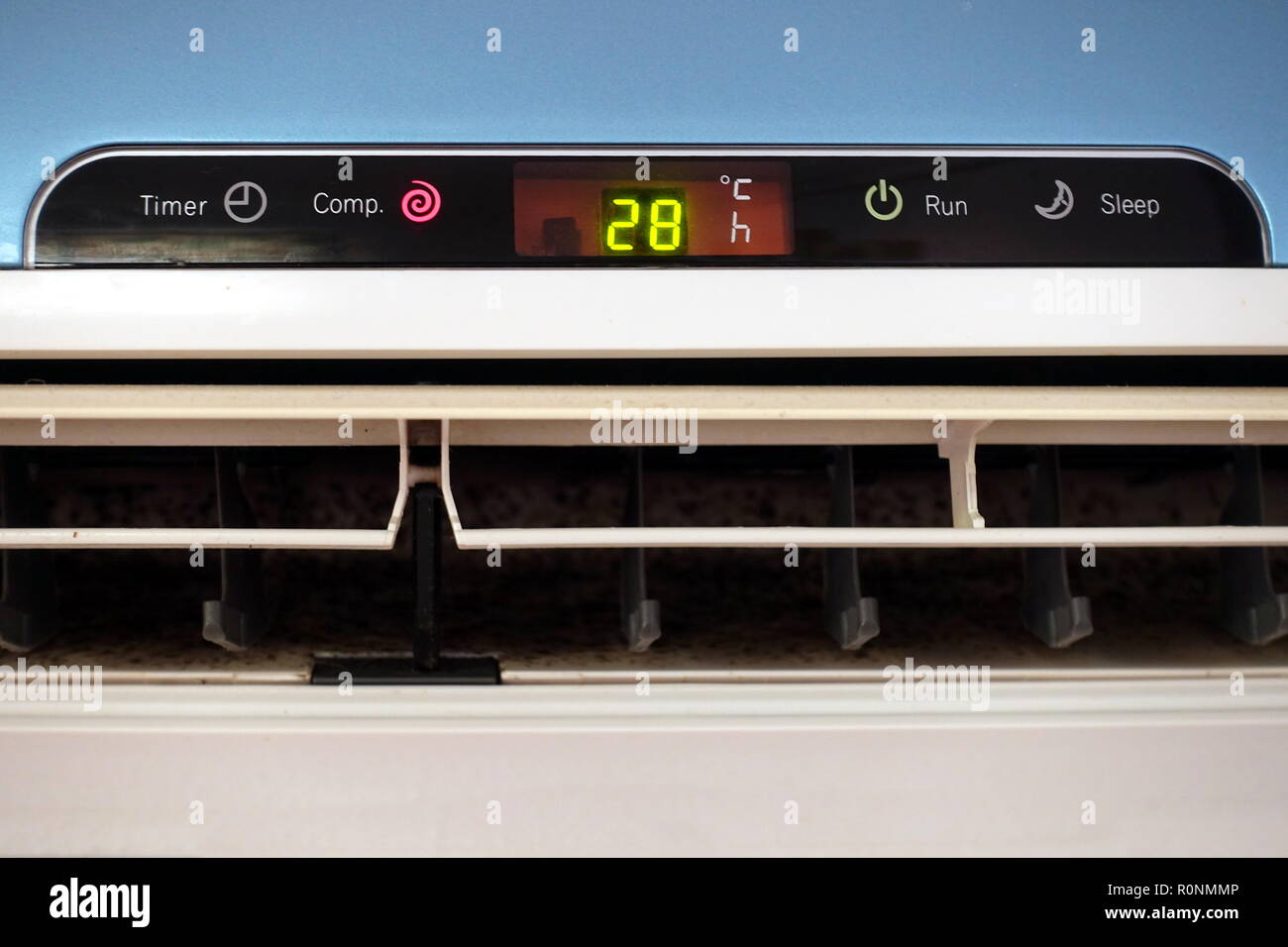 The display panel of a domestic AC or Air Conditioning unit, showing a  temperature of 28 degrees celsius Stock Photo - Alamy