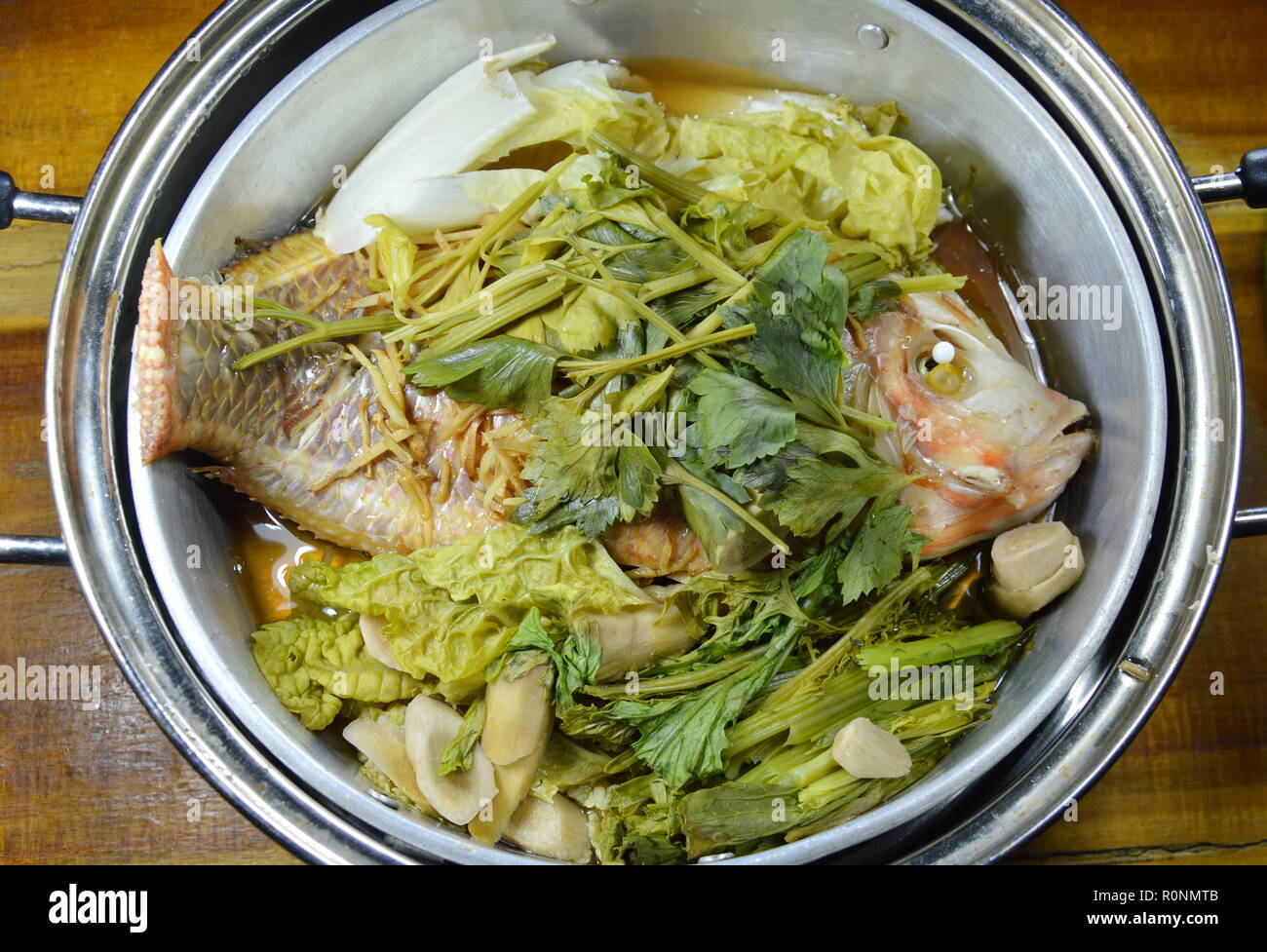 steam fish and vegetable in stainless steamer pot Stock Photo Alamy