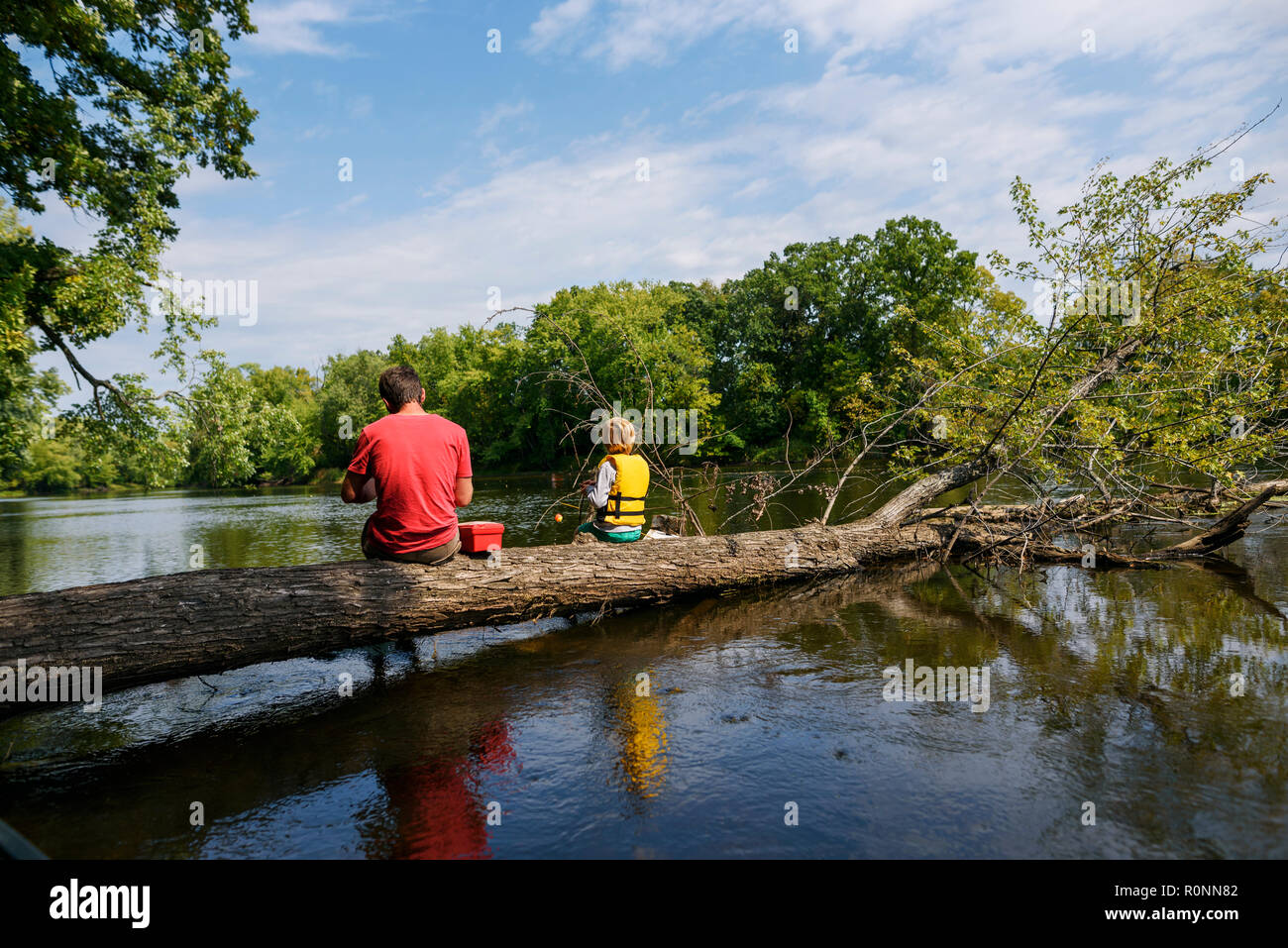 Two boys sitting fishing hi-res stock photography and images - Alamy