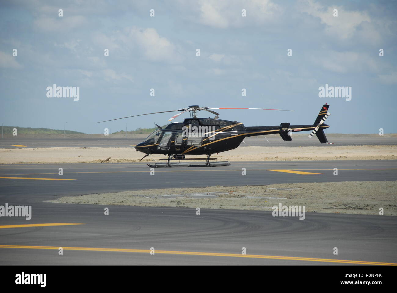 Istanbul, TURKEY – September 20, 2018: Genel Aviation Company's Bell 407 helicopter (TC-HLN) standing on the ground at the new Istanbul Airport before Stock Photo