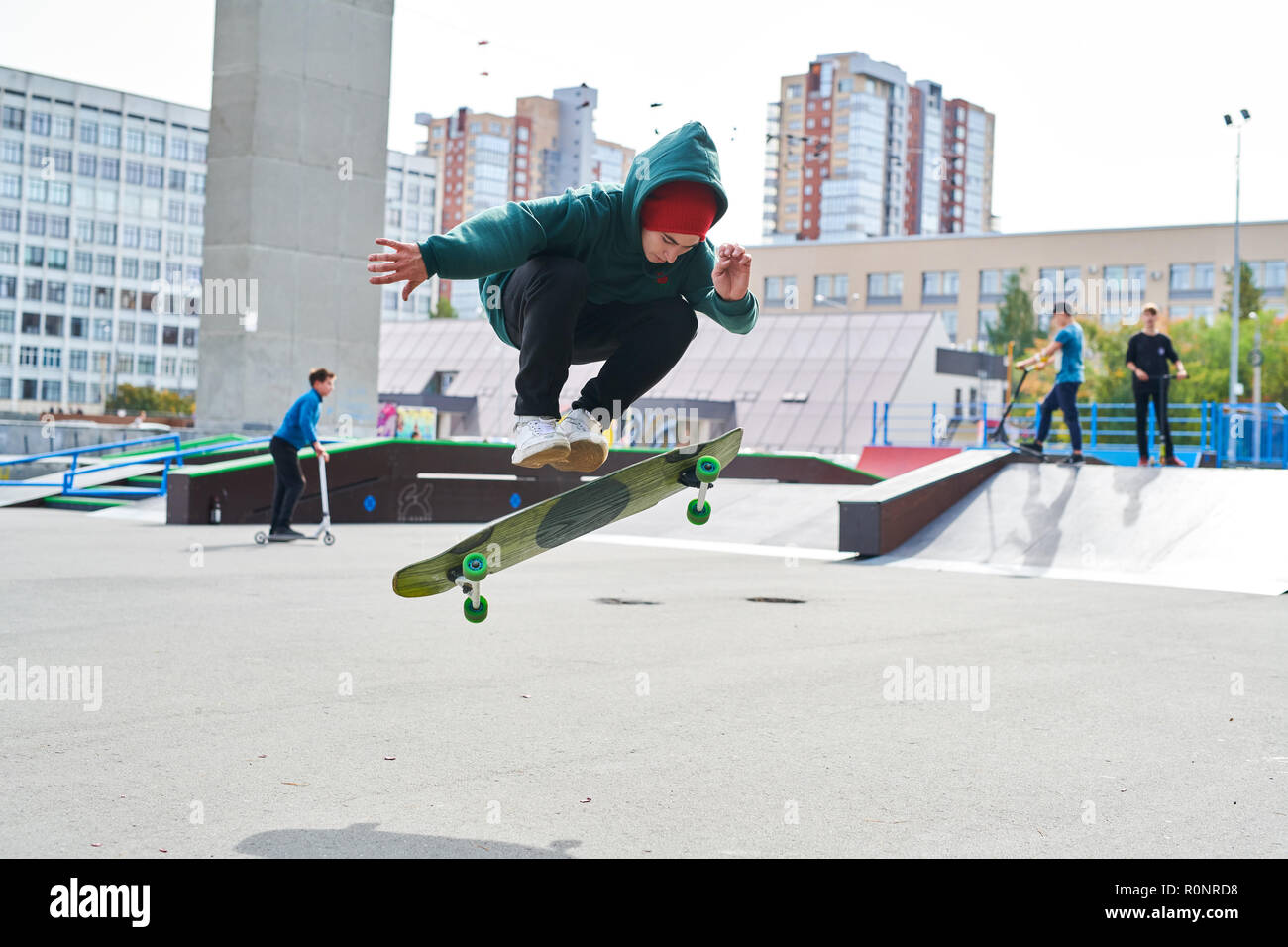 Boy jumping skateboard hi-res stock photography and images - Alamy