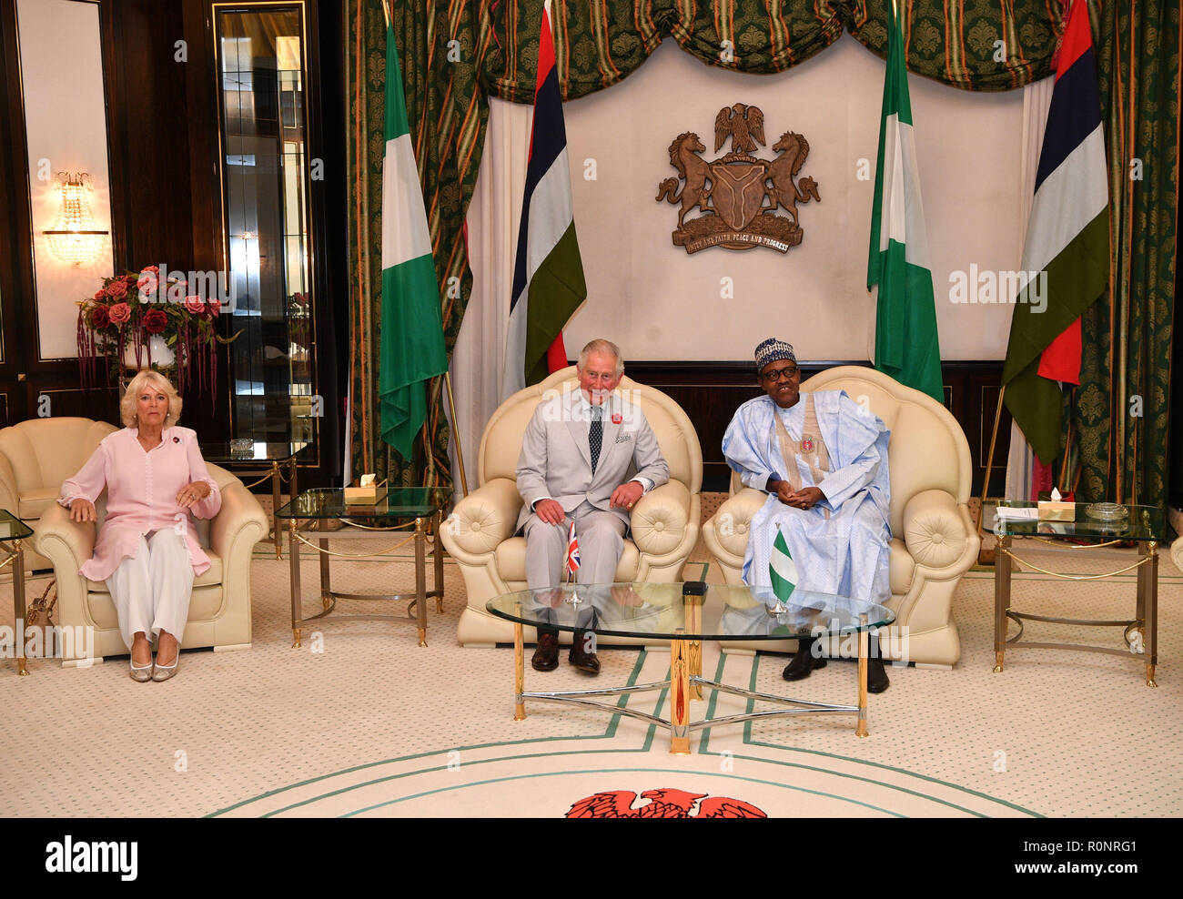 The Duchess of Cornwall and the Prince of Wales attend a meeting with Nigerian President Muhammadu Buhari at the presidential villa in Abuja, Nigeria, on day seven of the royal couple's trip to west Africa. Stock Photo