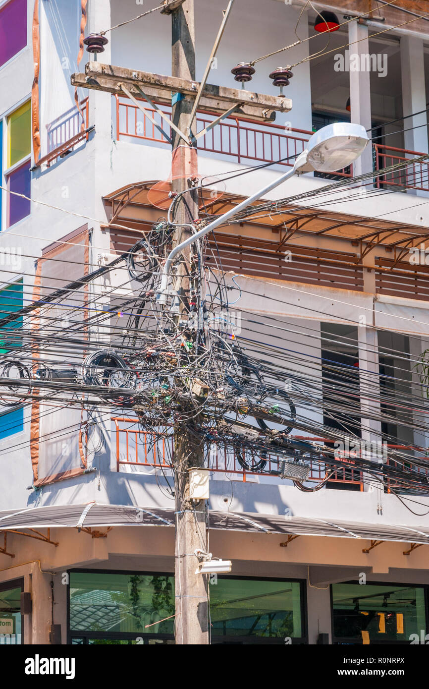 Electric wires on a pole of electric installation, Thailand Stock Photo ...