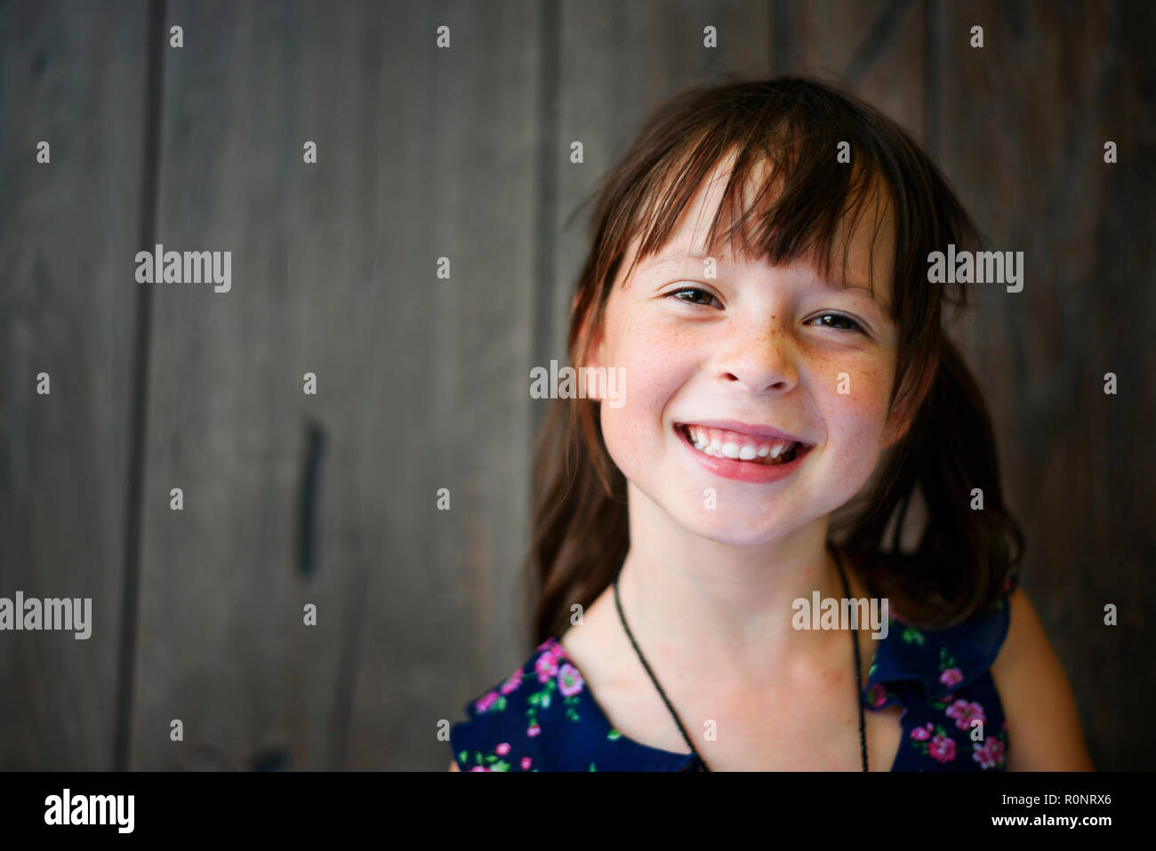 Smiling girl in floral hi-res stock photography and images - Alamy